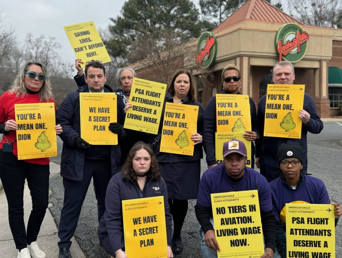 Flight attendants protesting the grand opening of the new PSA Airlines headquarters in Charlotte, North Carolina.