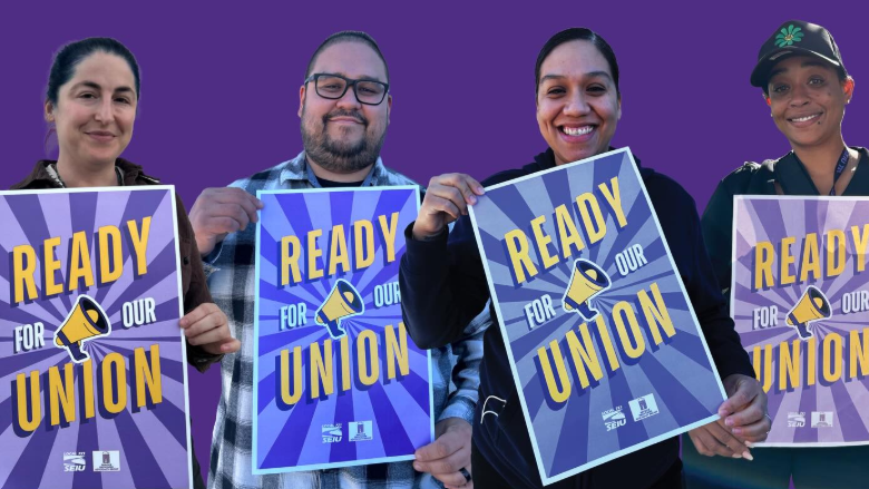 Workers hold signs that read, “Ready for our union.”