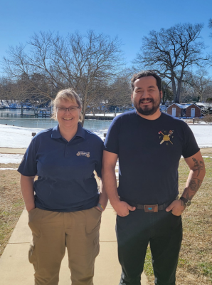 Two NFFE-IAM members pose for a picture together.