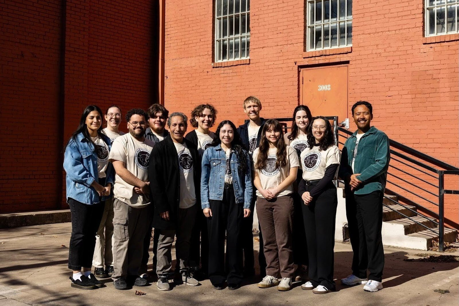 Fort Worth Report workers posing for a group picture together.