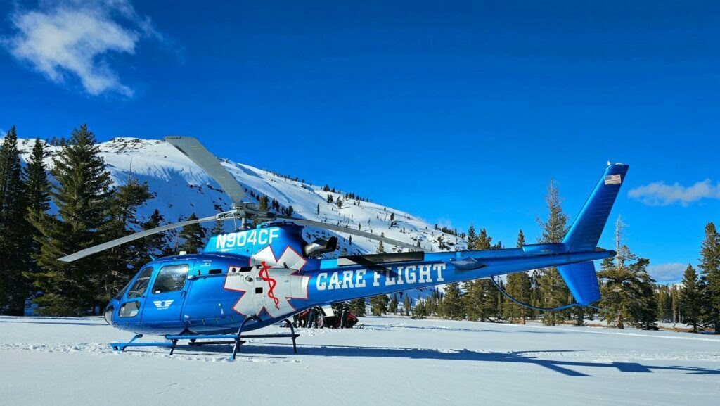 Emergency air ambulance on a snowy mountain.