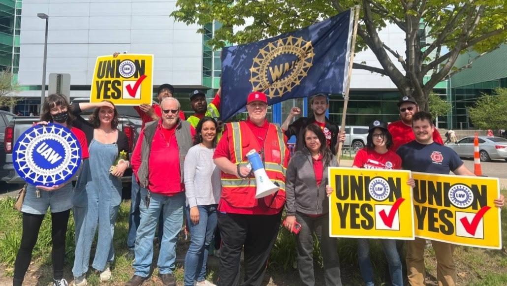 UAW members pose for photo.