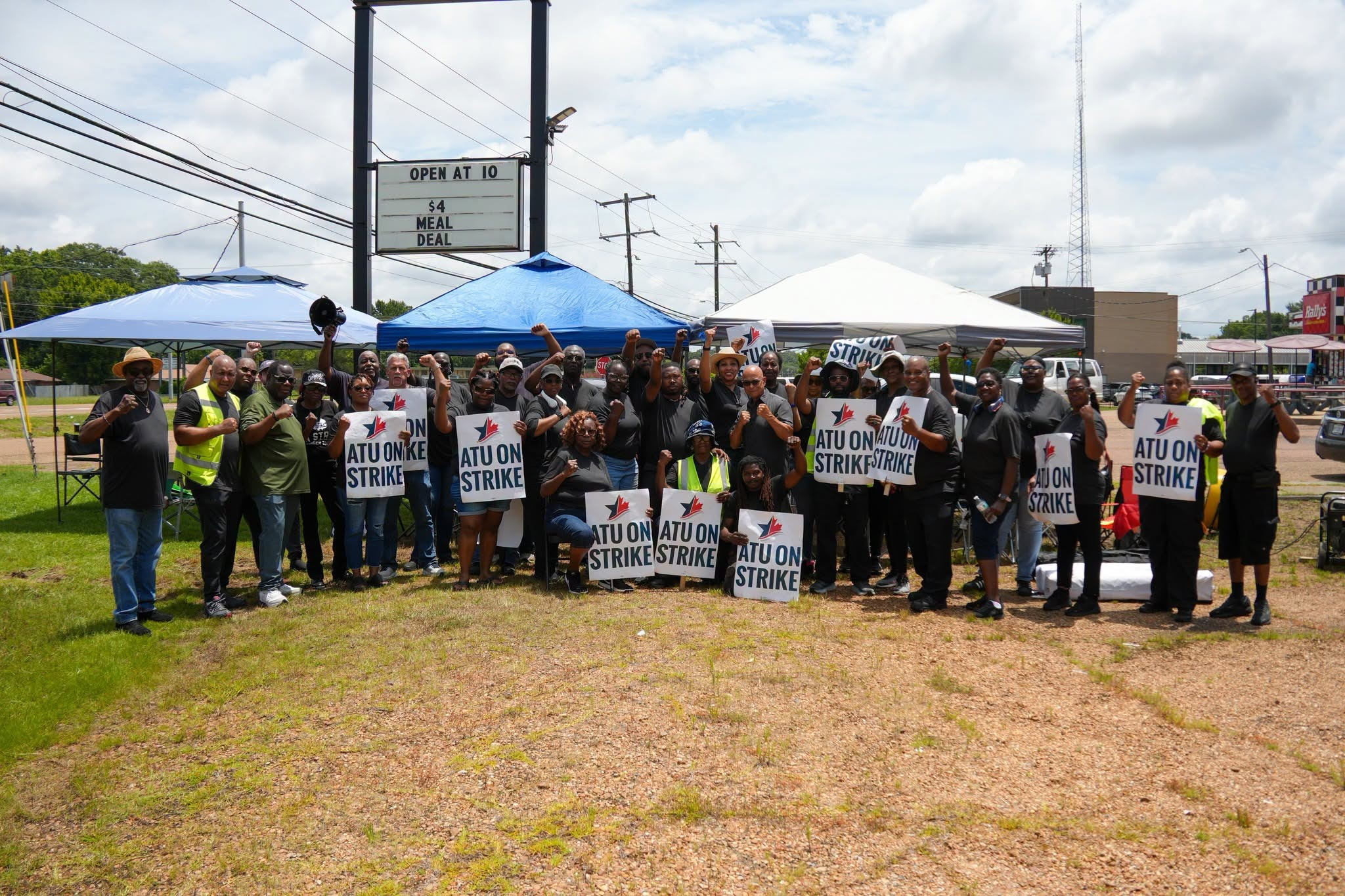 ATU Local 1208 members gather for a group picture.