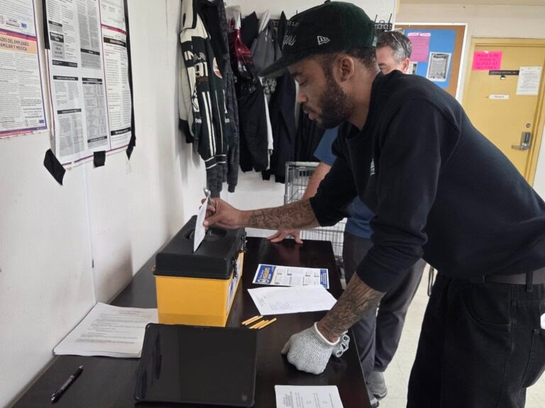 Members casting ballots in the contract ratification vote.